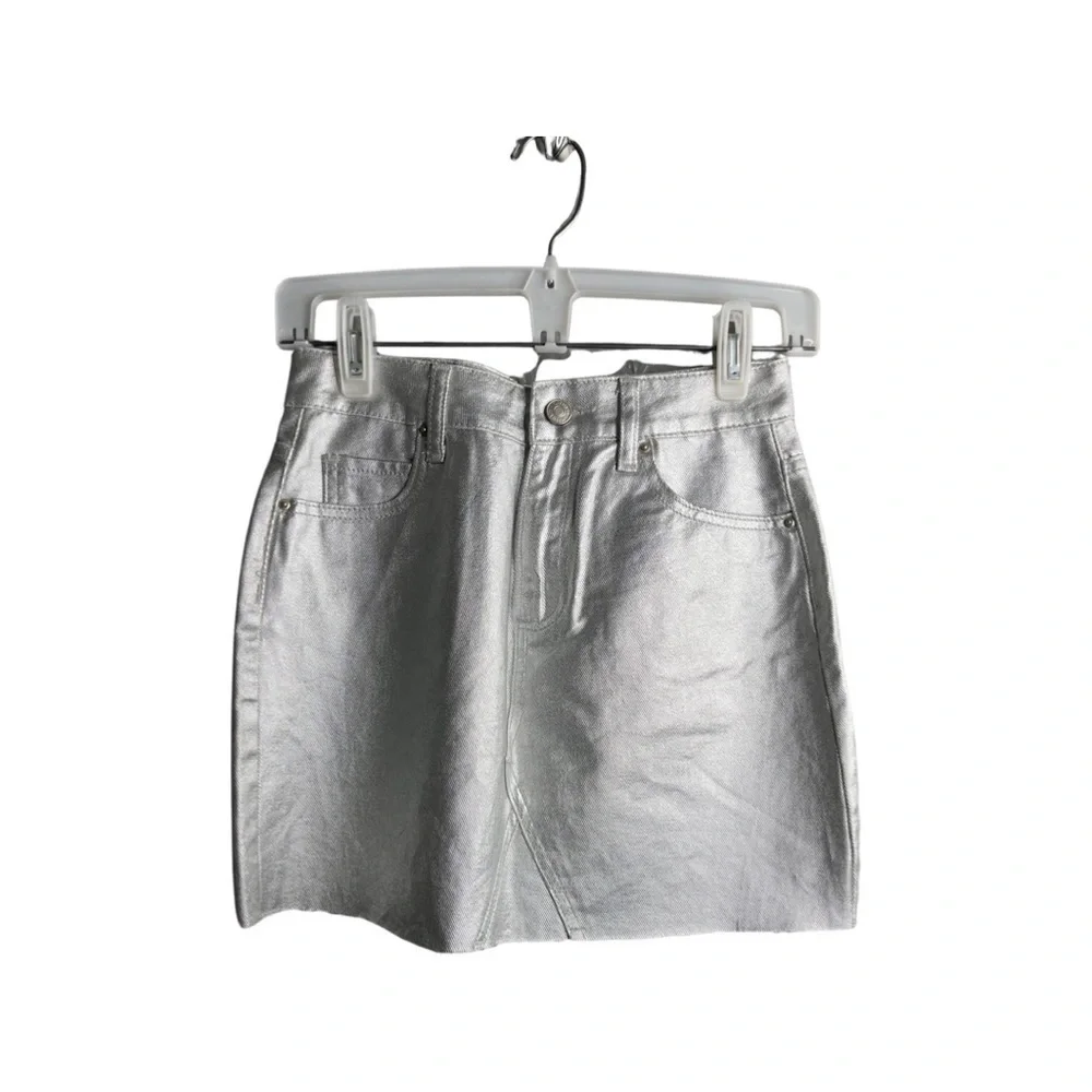 Forever 21 Silver faux leather raw hem mini skirt size small with 5 pockets.
